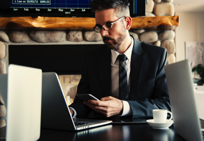 man in-black-holding-phone-618613-revized